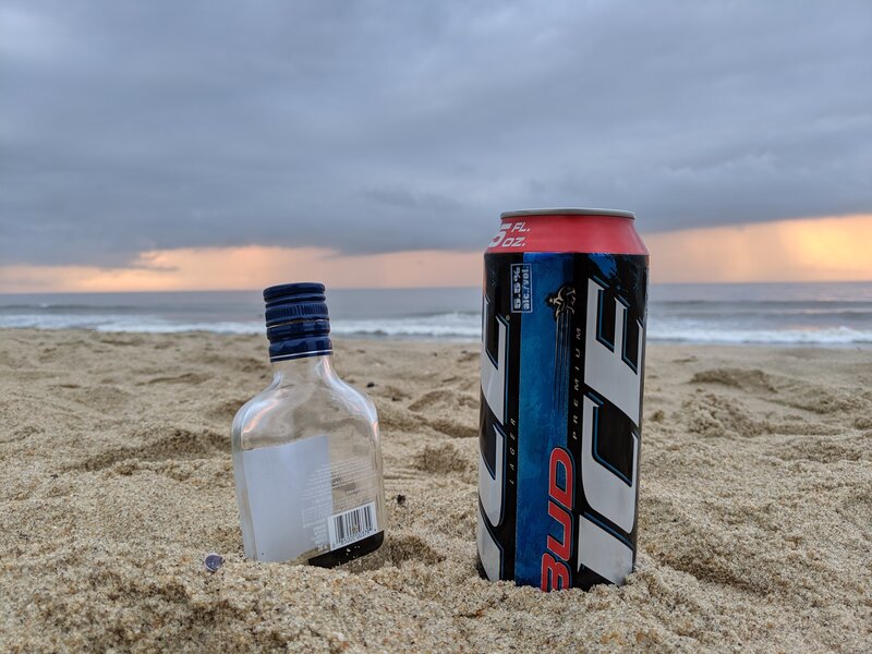 Alcohol Bottles on Beach