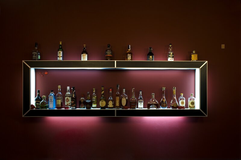 Alcohol Bottles on Shelf — Maroon, Dark, Photograph