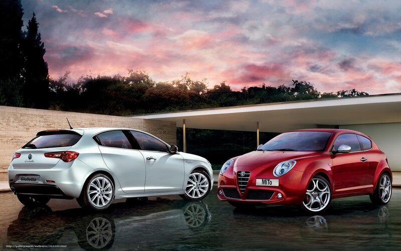 Alfa Romeo cars at sunset