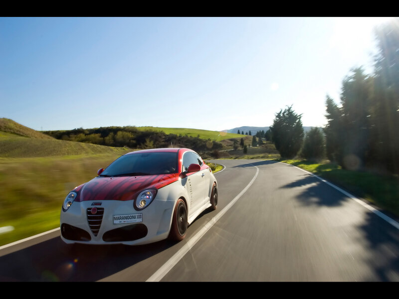 Alfa Romeo driving on a country road