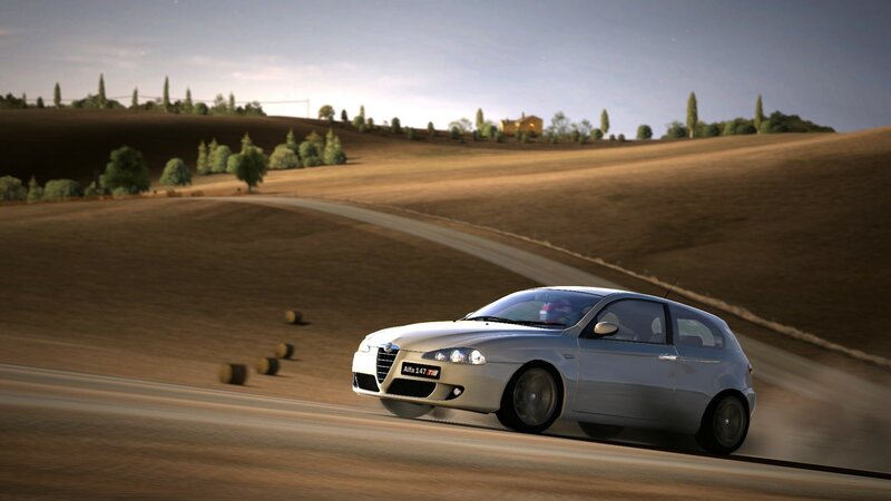 Alfa Romeo driving on country road