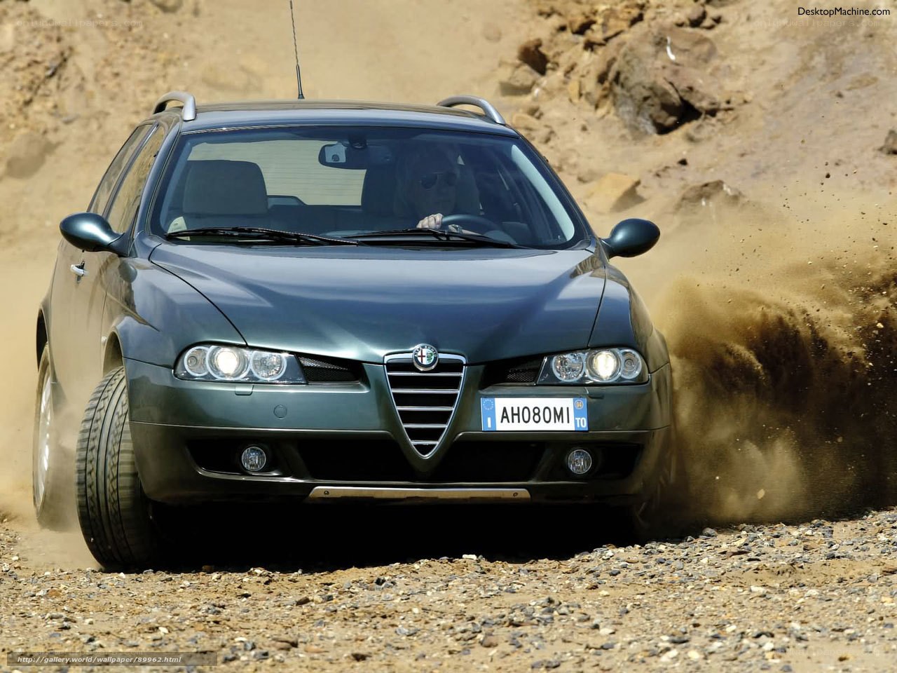 Alfa Romeo driving on dirt road