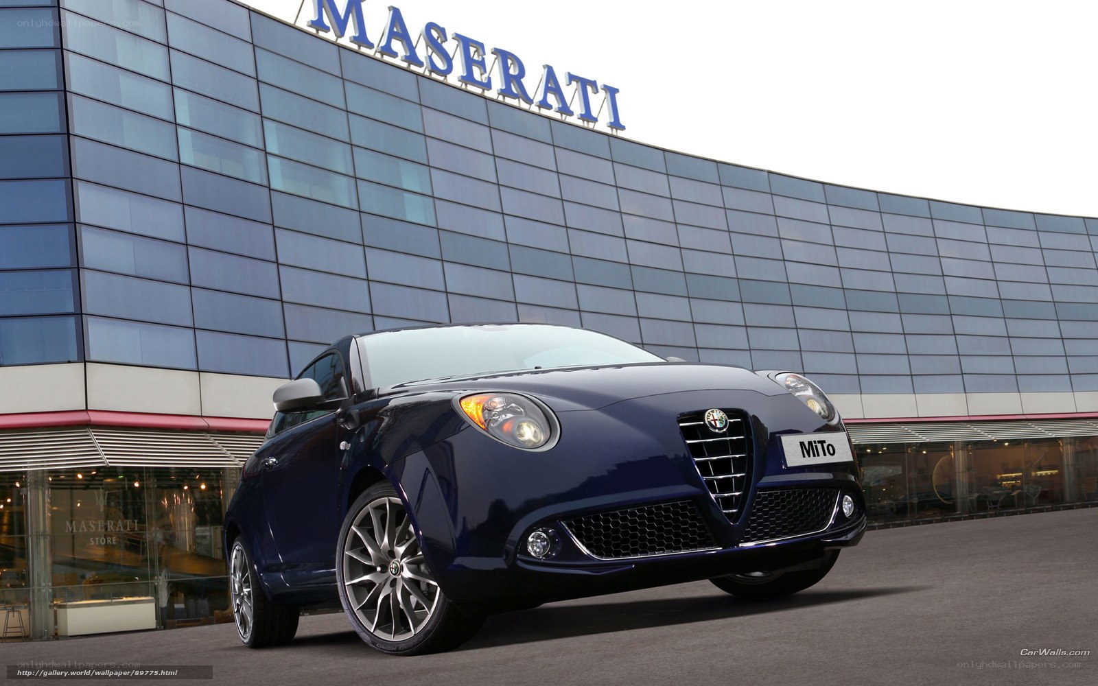 Alfa Romeo MiTo in front of Maserati building