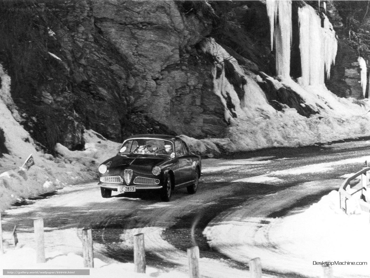 Alfa Romeo on snowy mountain road