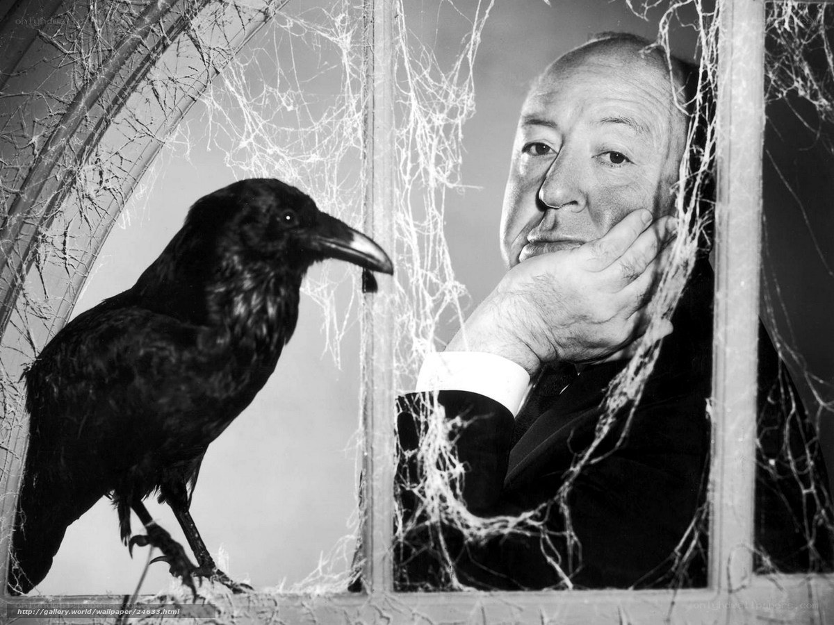 Alfred Hitchcock with a crow