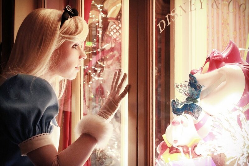 Alice in Wonderland cosplayer at window