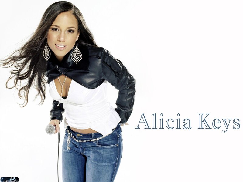Alicia Keys holding a microphone