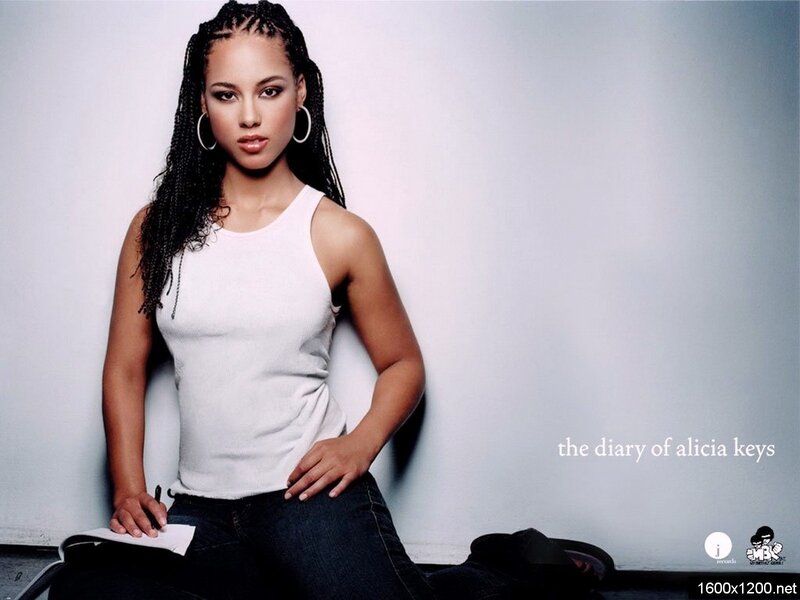 Alicia Keys in white tank top