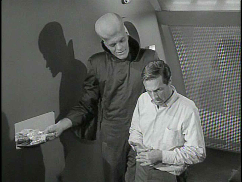 Alien and Man in Room