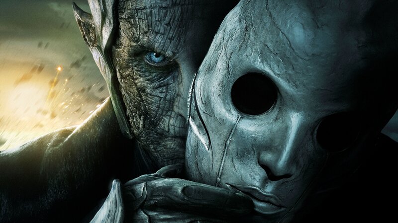 Alien Character Holding Mask