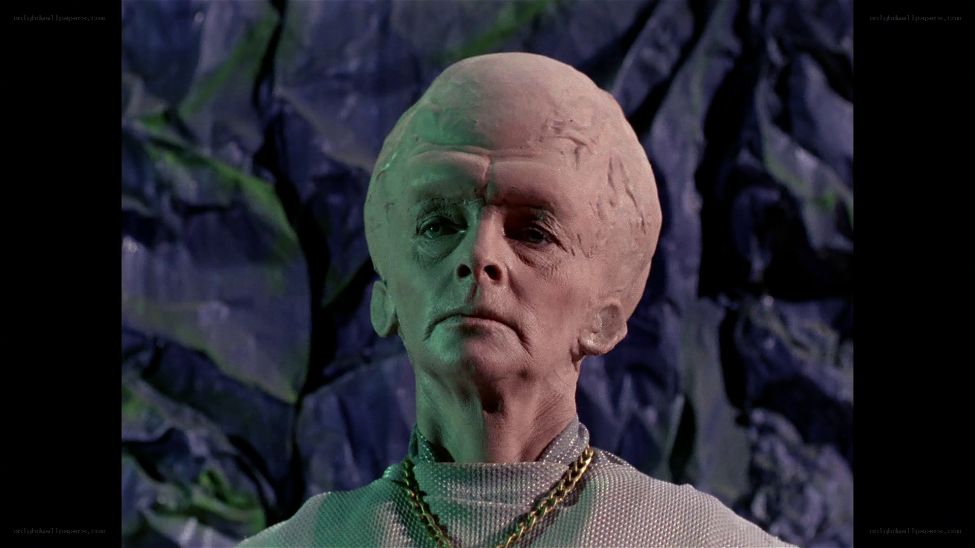 alien character in green light