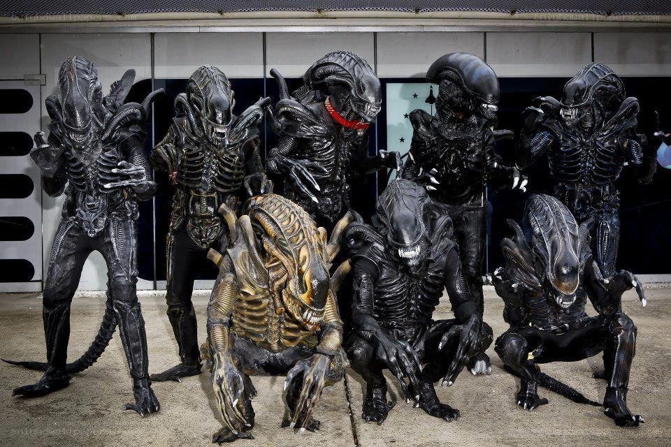 Alien creature costumes in formation