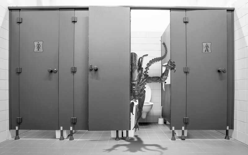 Alien Creature in Restroom