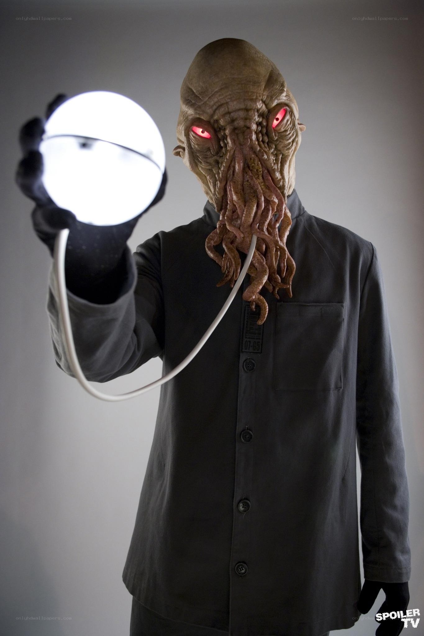 alien creature with glowing orb
