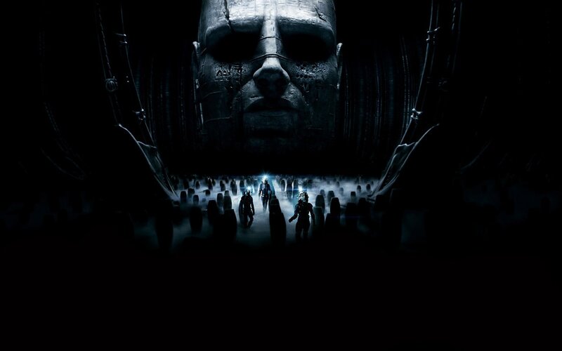 Alien face in dark chamber
