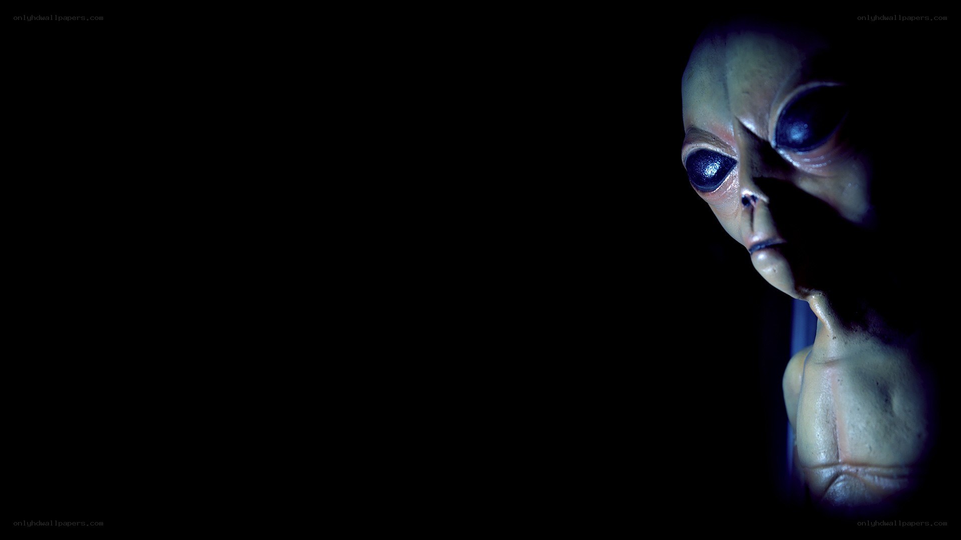 alien figure in dark setting