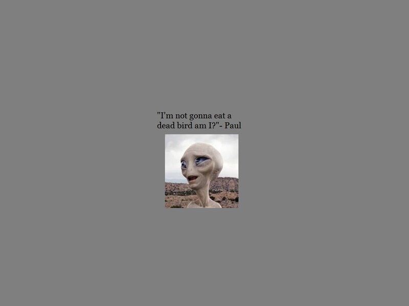 Alien Figure in Desert