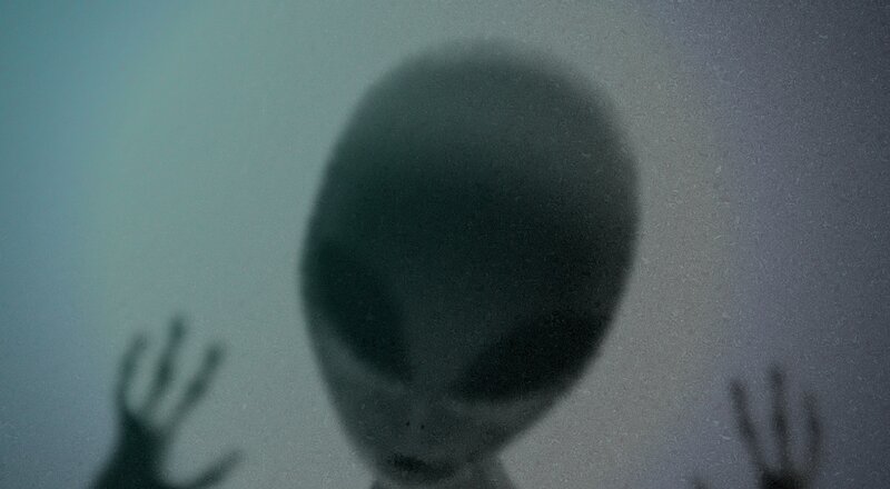 Alien Figure in Fog