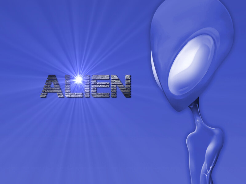alien figure with glowing text