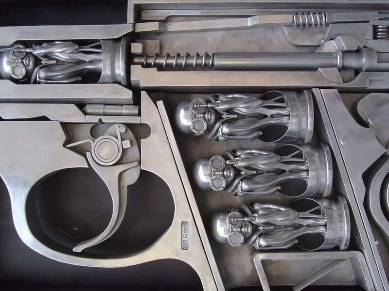 Alien Figures in Gun