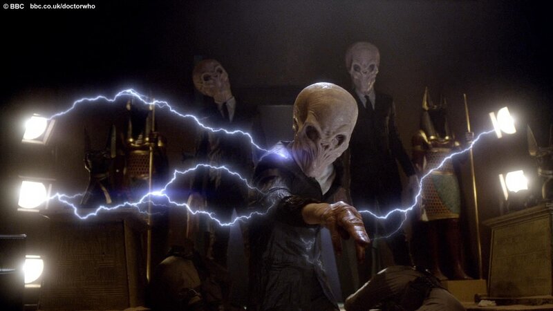 Alien Figures with Lightning
