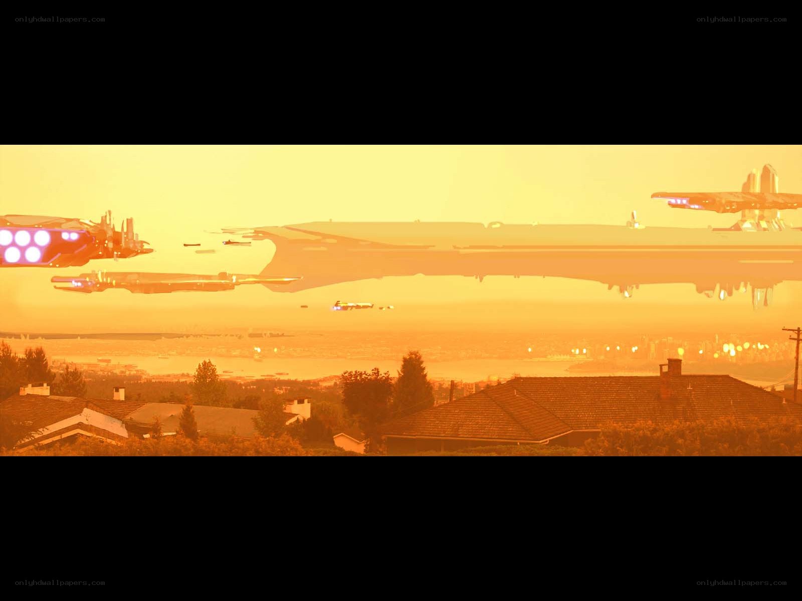 Alien fleet over suburban town