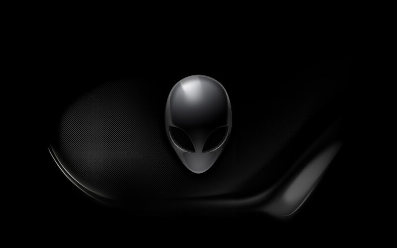 Alien head logo on dark background