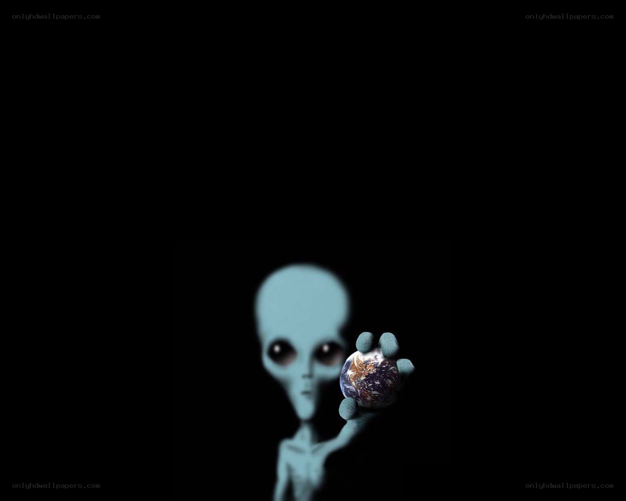 alien holding earth