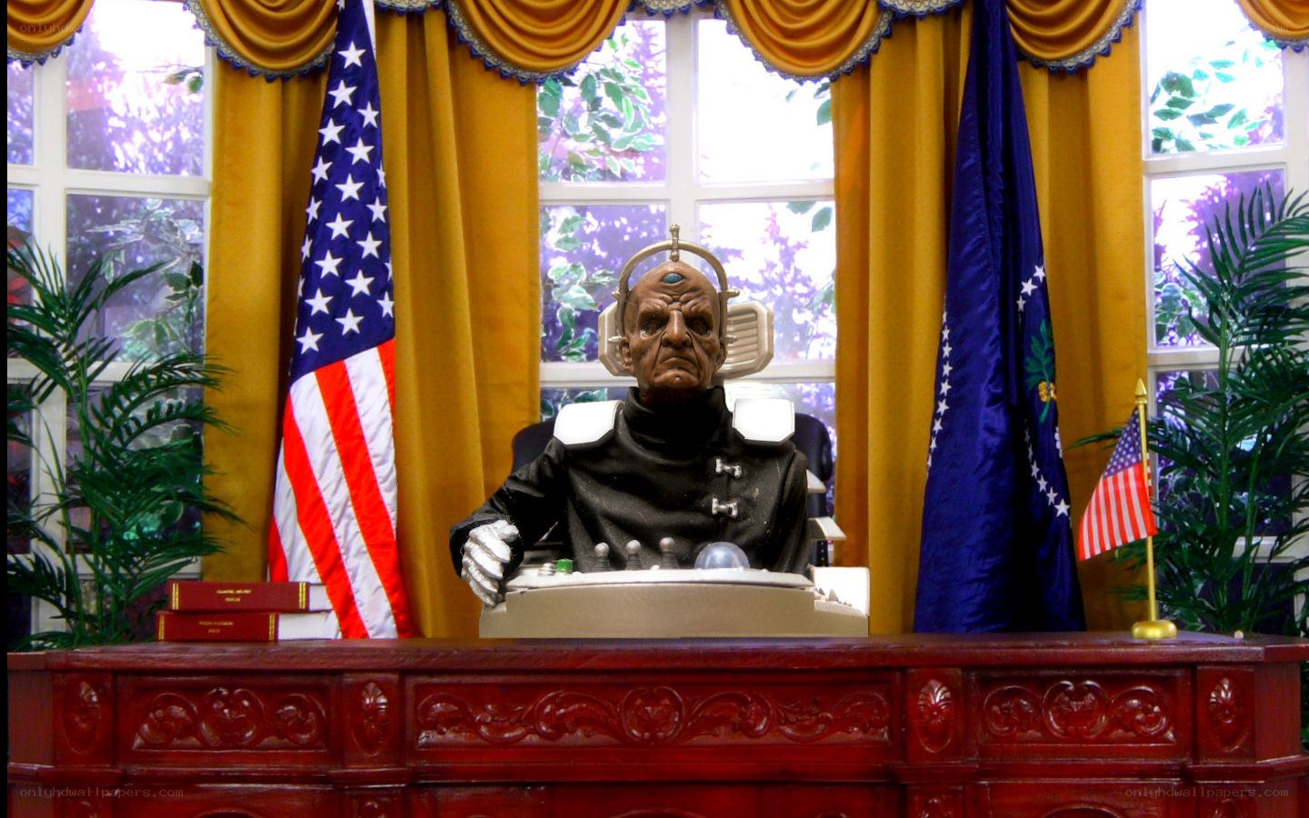 alien leader at desk