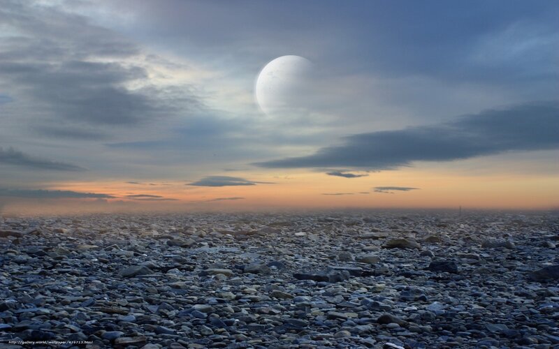 Alien moon over rocky plain