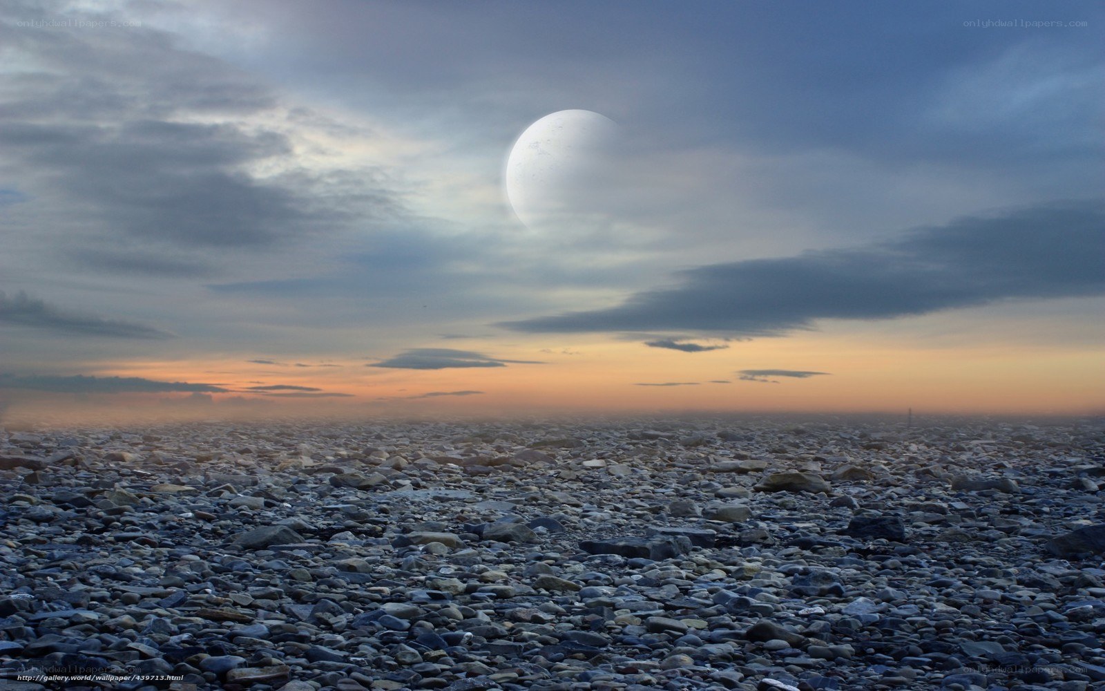 Alien moon over rocky plain