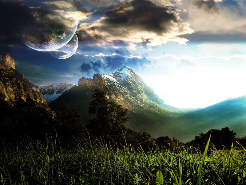 Alien planets over mountain landscape