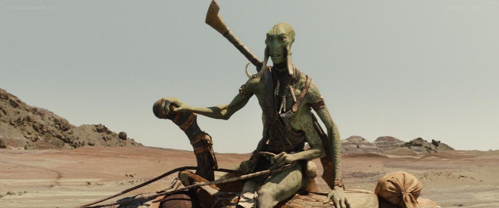 alien rider in desert landscape
