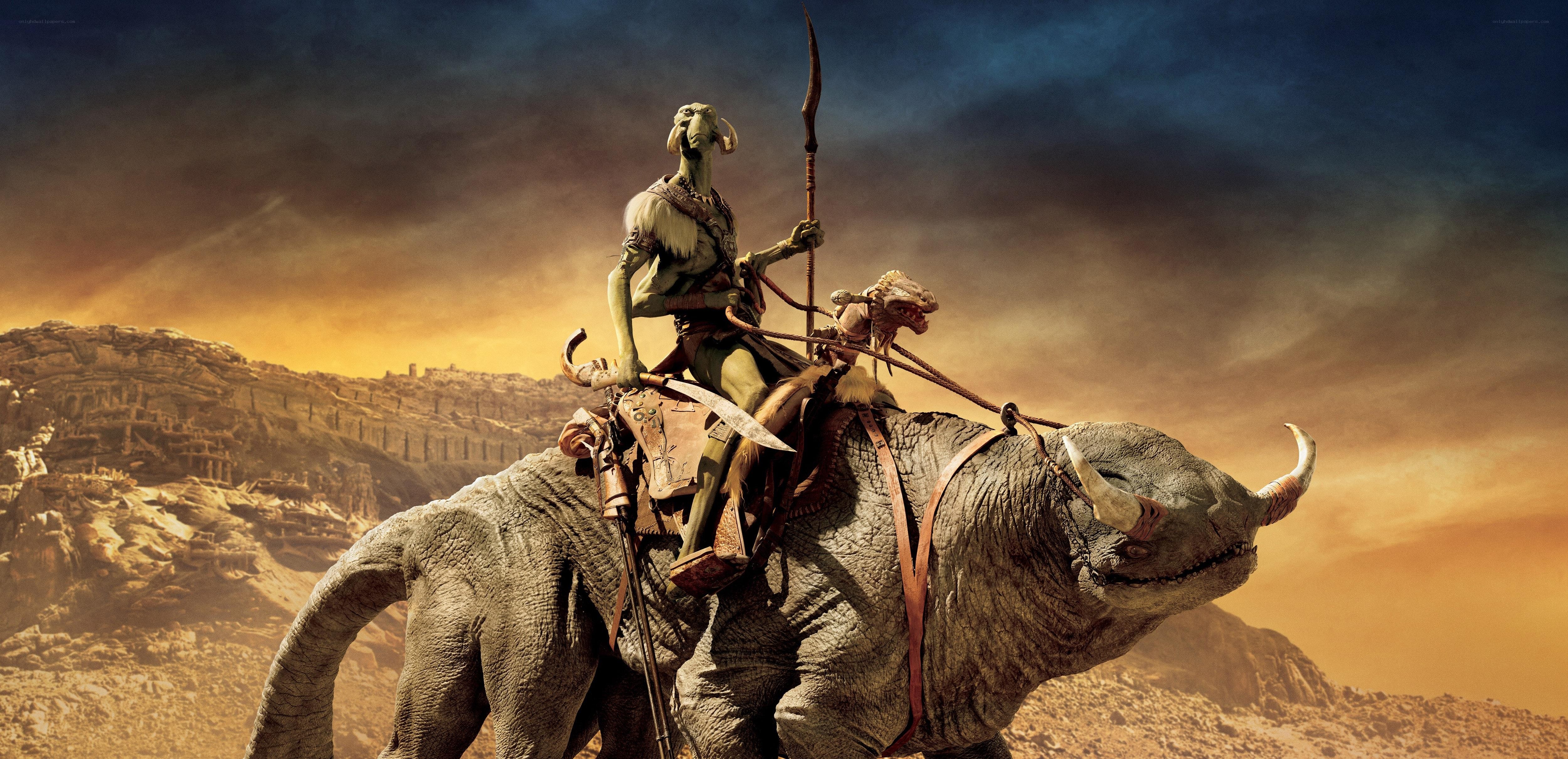alien rider on desert creature