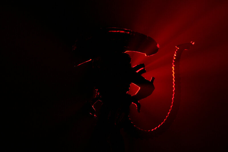 Alien silhouette in red light