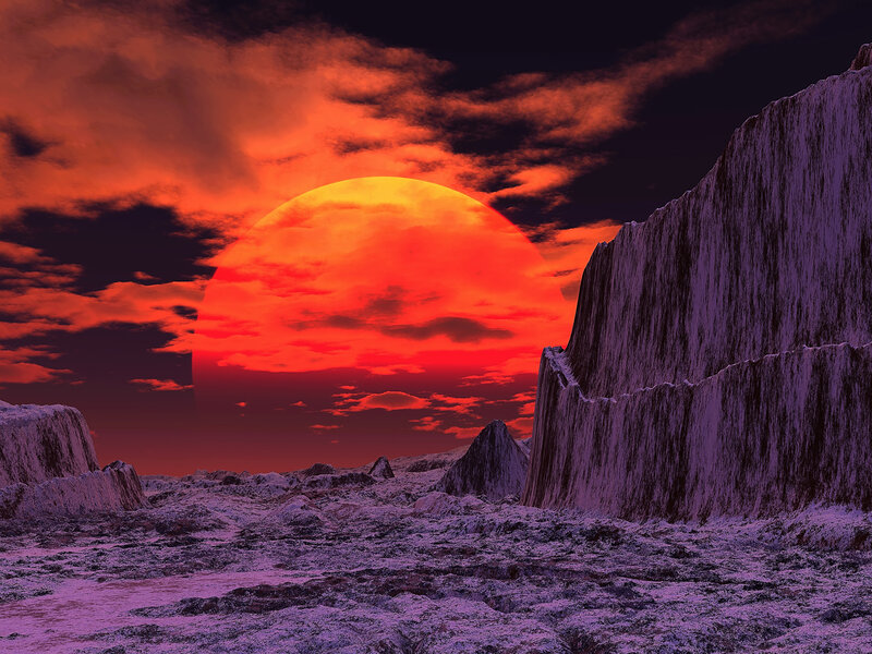 Alien sunset on a rocky planet