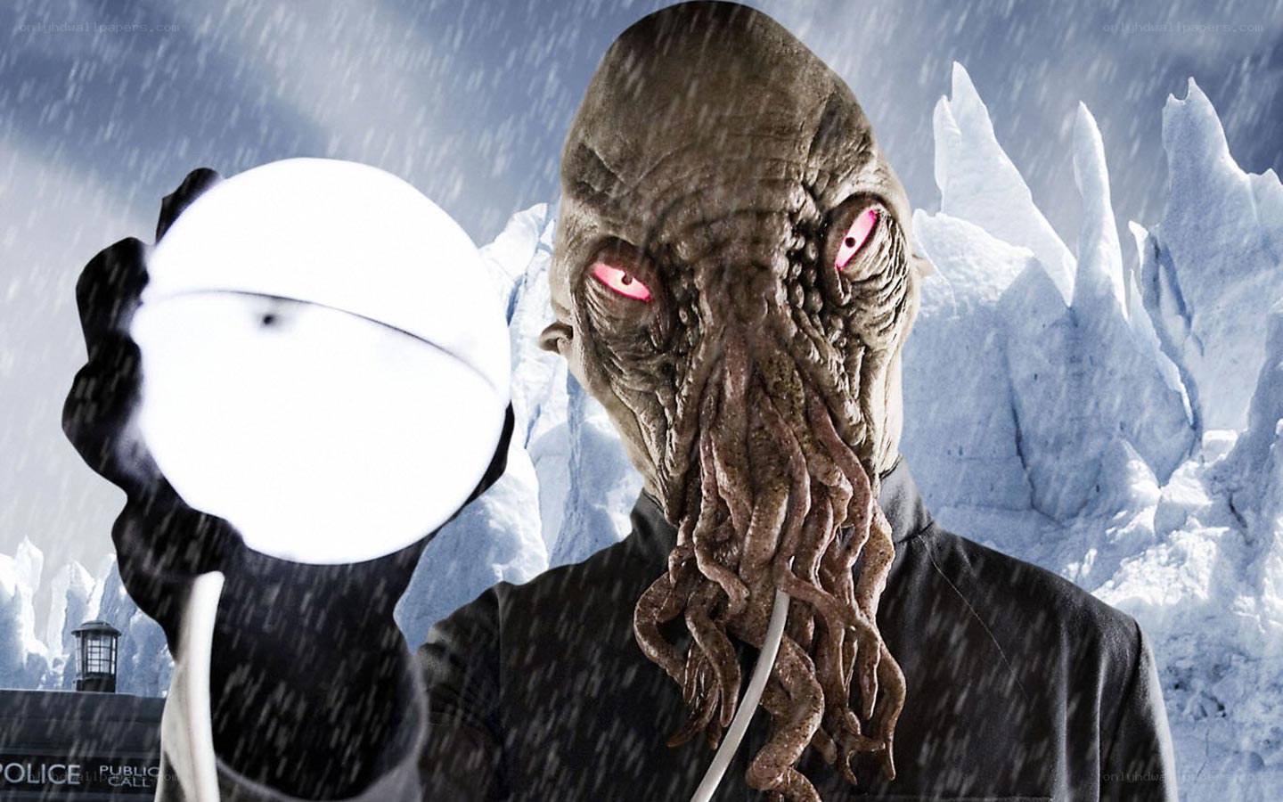alien with glowing orb in snow