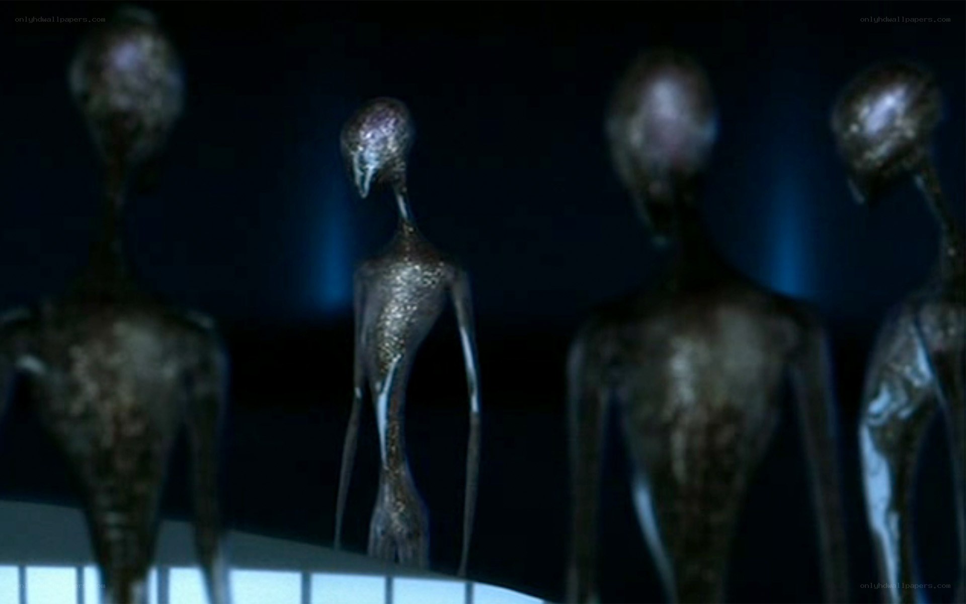 aliens in dark room