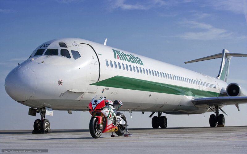 Alitalia plane with motorcycle
