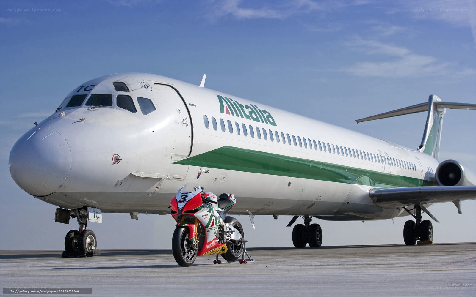 Alitalia plane with motorcycle