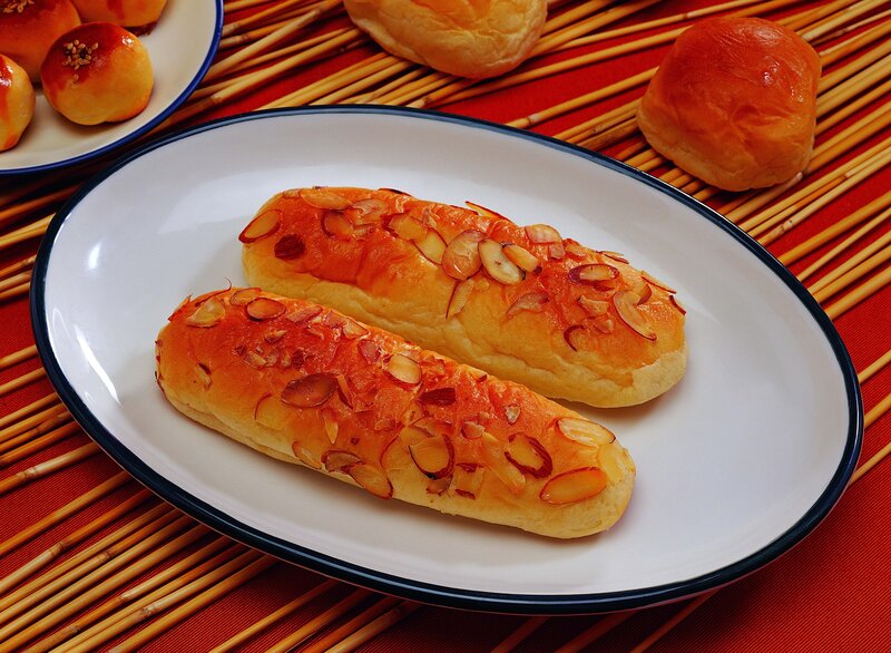almond bread rolls on plate