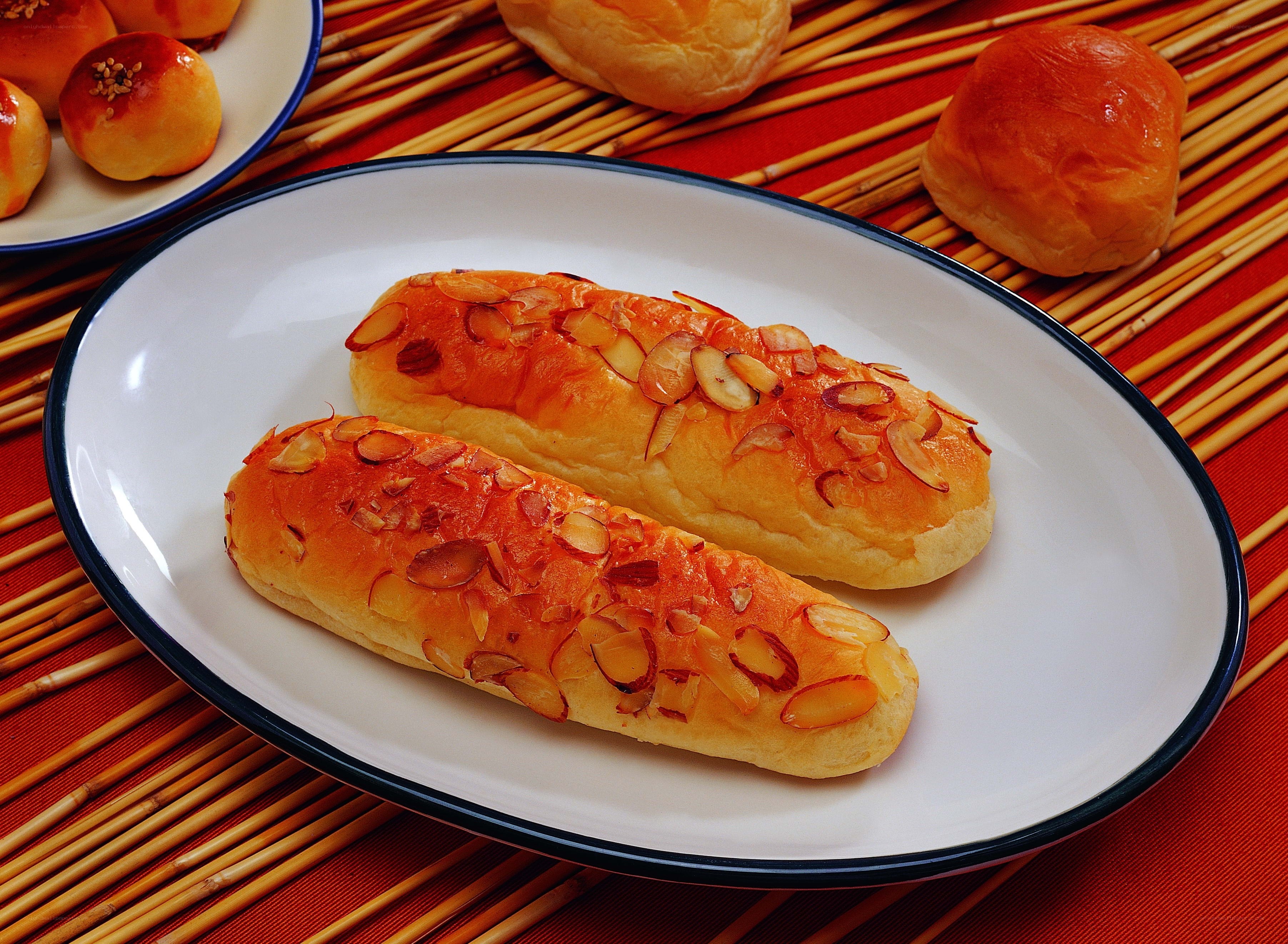almond bread rolls on plate