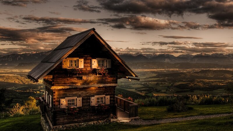 Alpine cabin at sunset