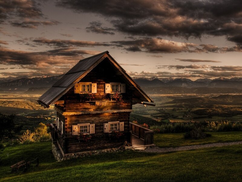 Alpine cabin at sunset