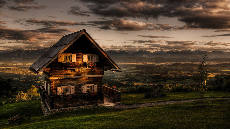 Alpine cabin at sunset