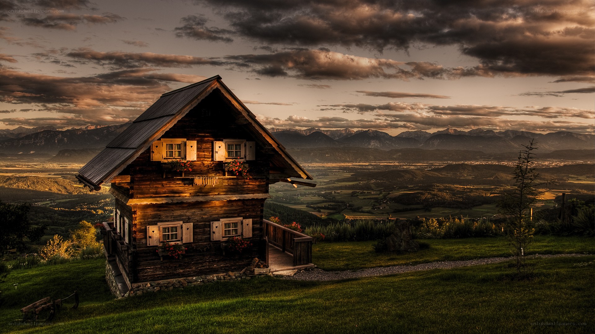 Alpine cabin at sunset