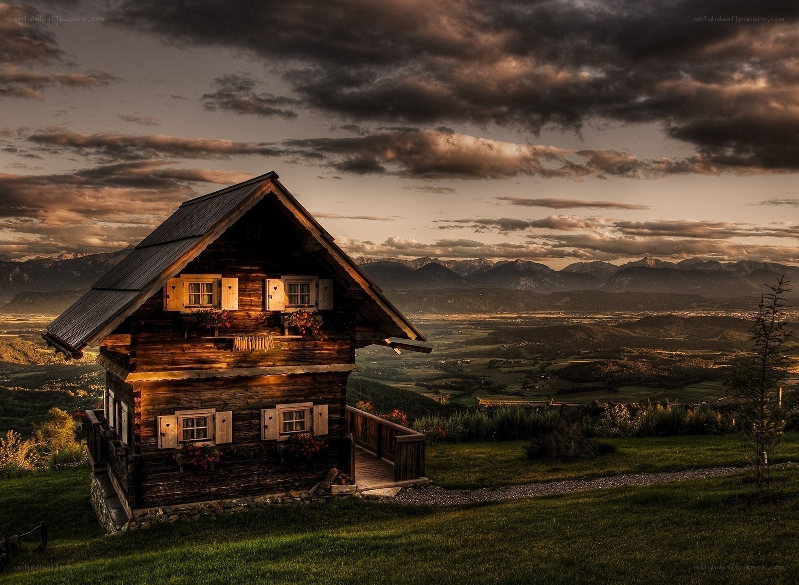 Alpine cabin at sunset