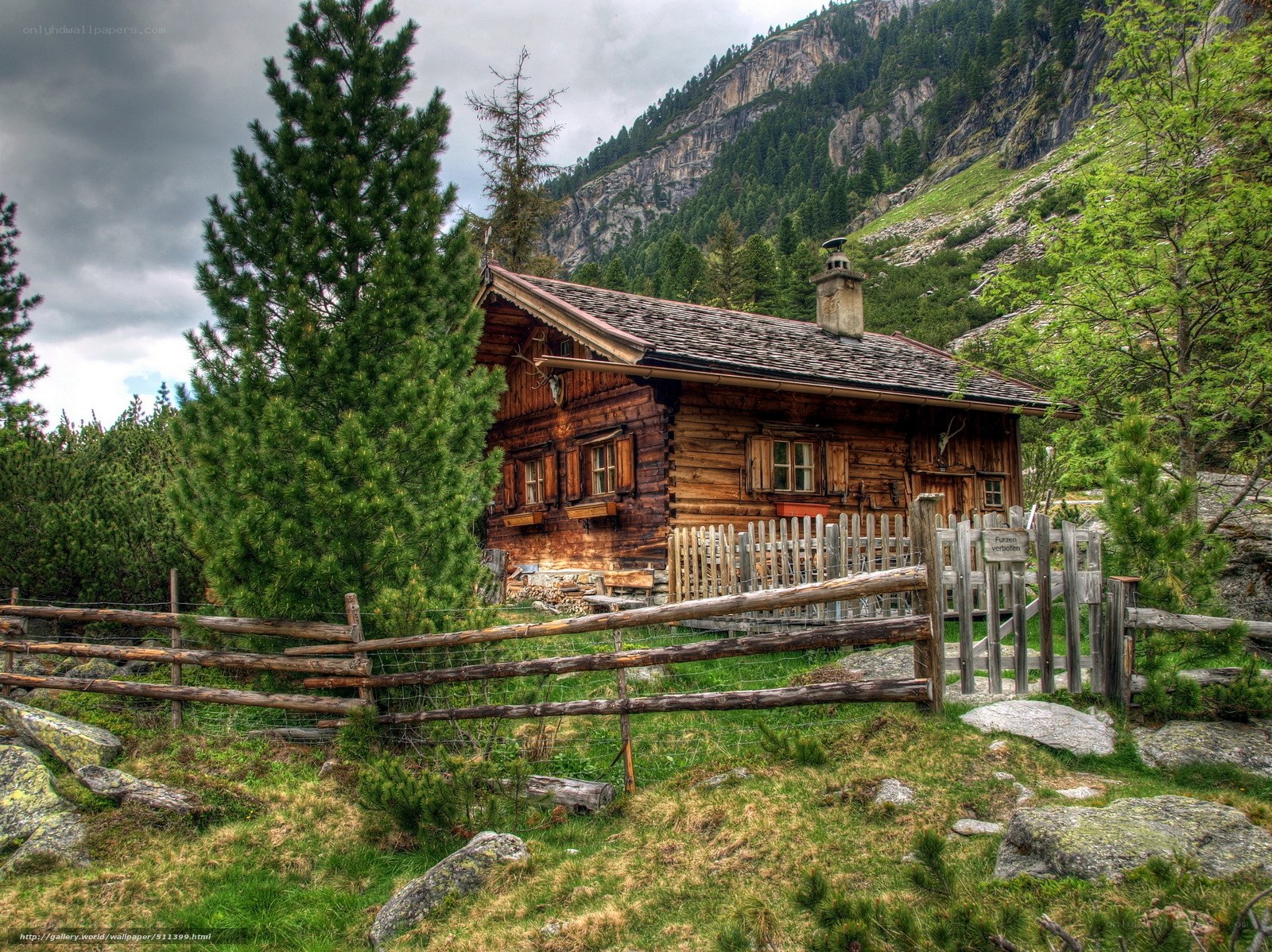 Alpine cabin in mountain valley