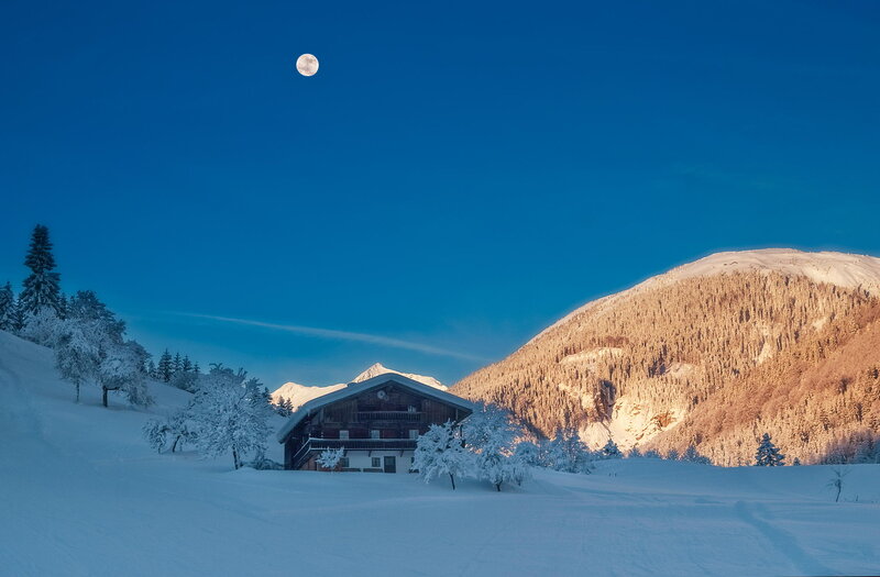 Alpine Cabin in Snow