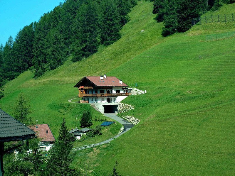 Alpine House on Hillside